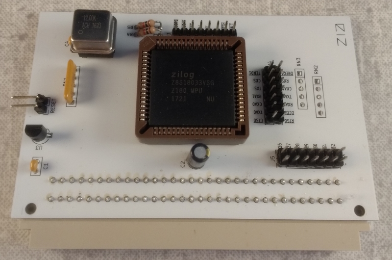 Little white PCB with a Z180 CPU on it