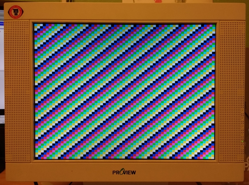 Monitor displaying a diagonal pattern of little coloured squares